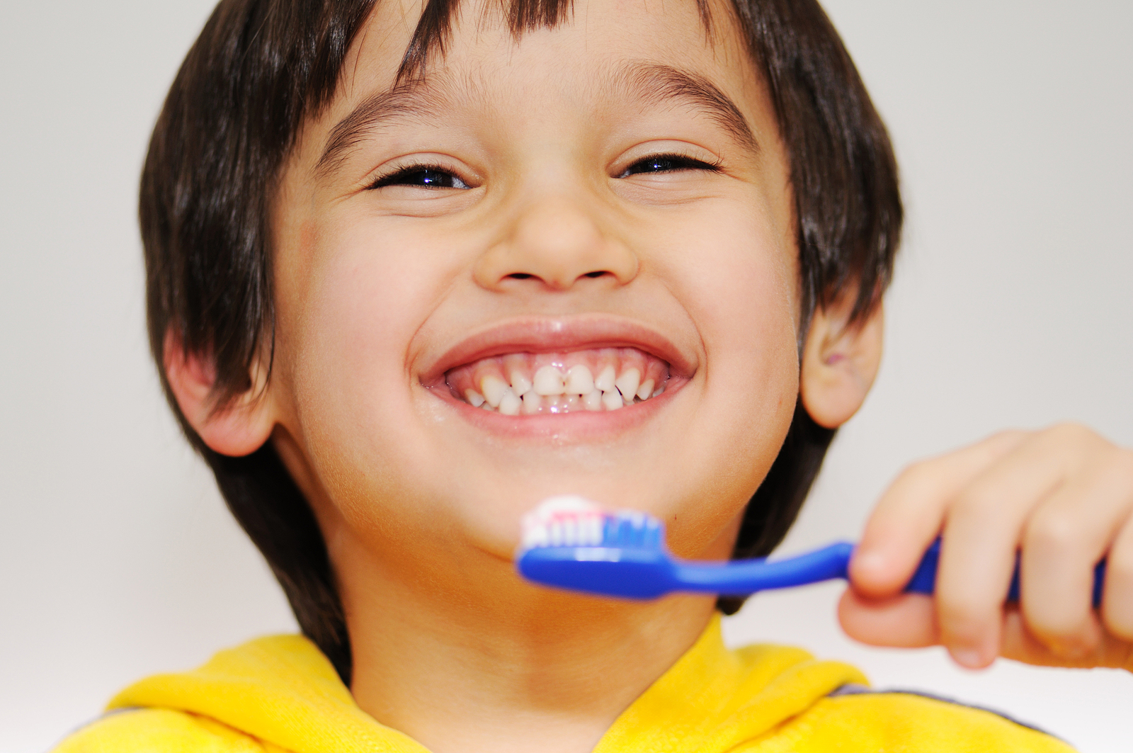 Four Ways to Help Your Kid Brush Their Teeth Regularly